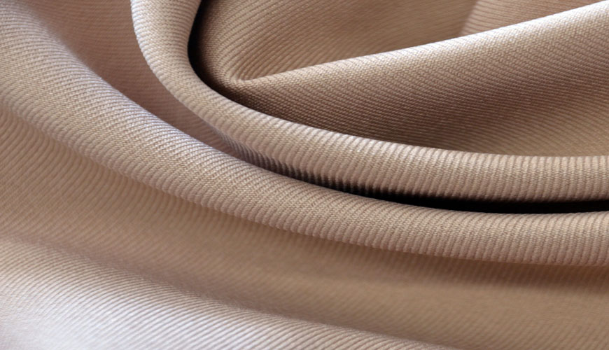 DIN 53860 Tekstillerin Test Edilmesi - Tekstil Kumaşlarının Şişkinlik Eğiliminin Test Edilmesi